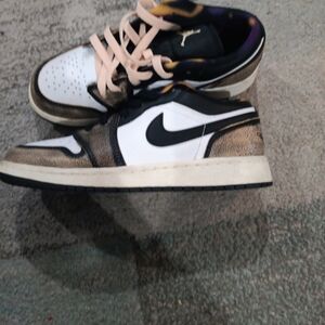 Jordan Nike Black and White Sneakers with Gold Highlights